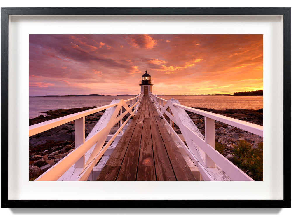 Framed print of a vibrant sunset at Marshall Point Lighthouse