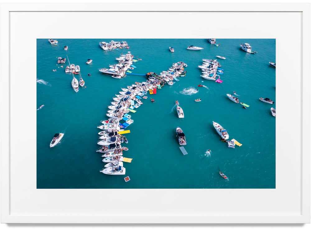 Framed print of a line of boats in Lake Michigan