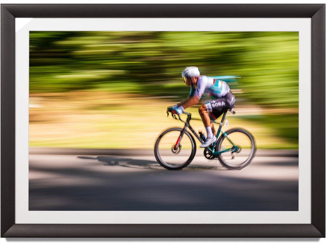 Framed print of a cyclist in Switzerland